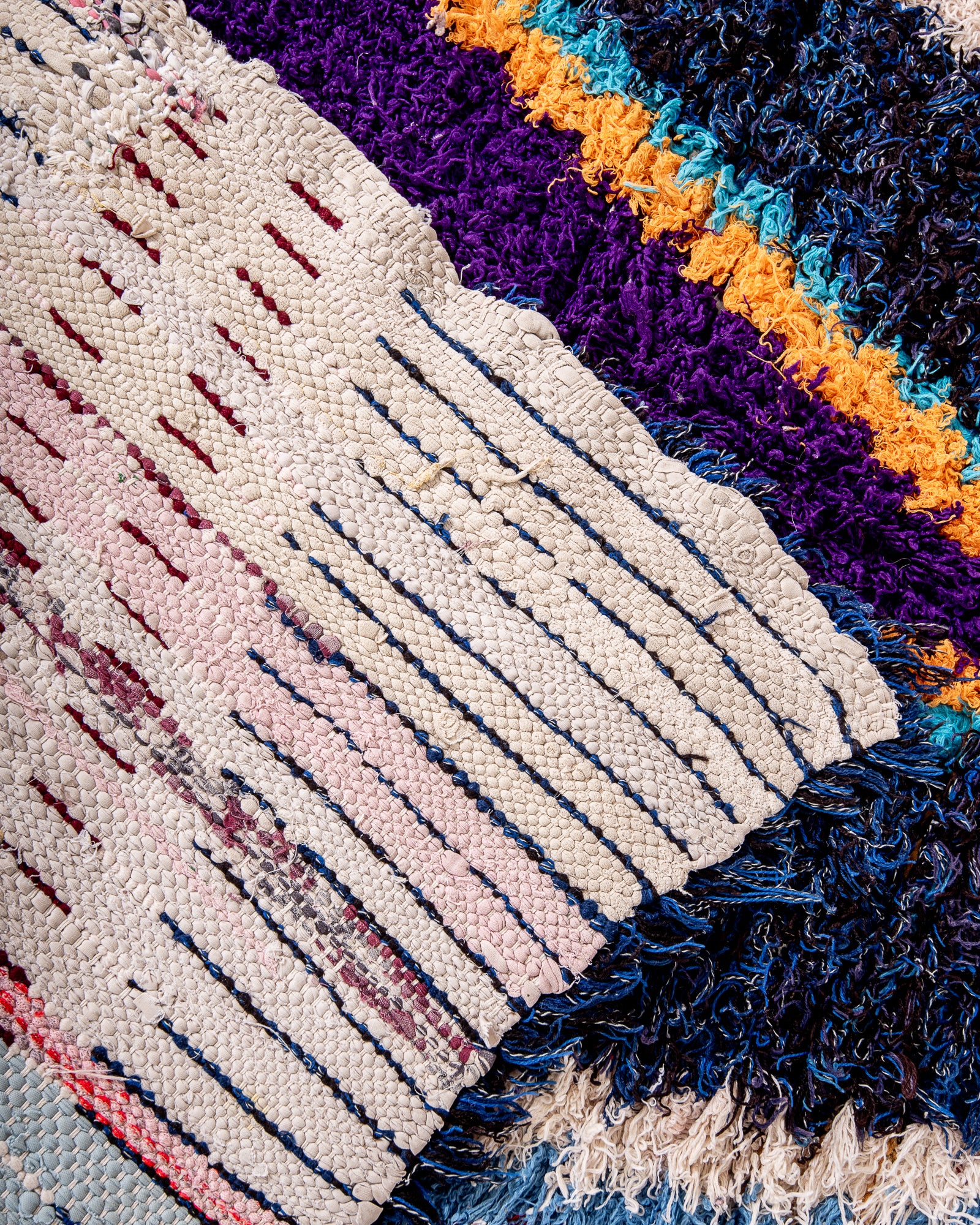 Vintage, handcrafted Berber rug from Morocco. Boucherouite carpet with beautiful colours and patterns and heavy cotton texture.